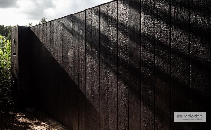 Modern gate in black charred wood, Sint-Martens-Latem Modern gate in black charred wood, Sint-Martens-Latem