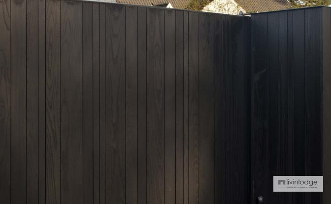 Vertical gate cladding with black finish Vertical gate cladding with black finish