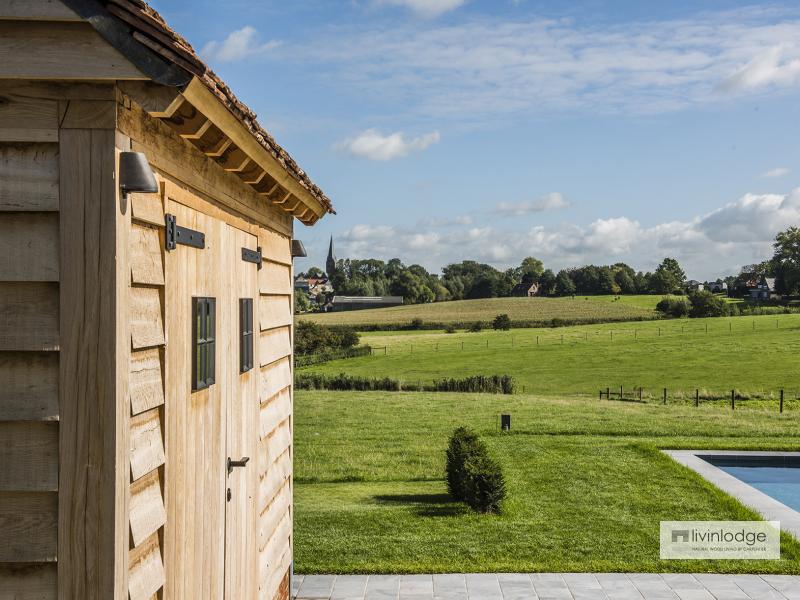 Moderne tuinberging annex loungeruimte te Roeselare | Houten bijgebouwen op maat Moderne tuinberging annex loungeruimte te Roeselare | Houten bijgebouwen op maat