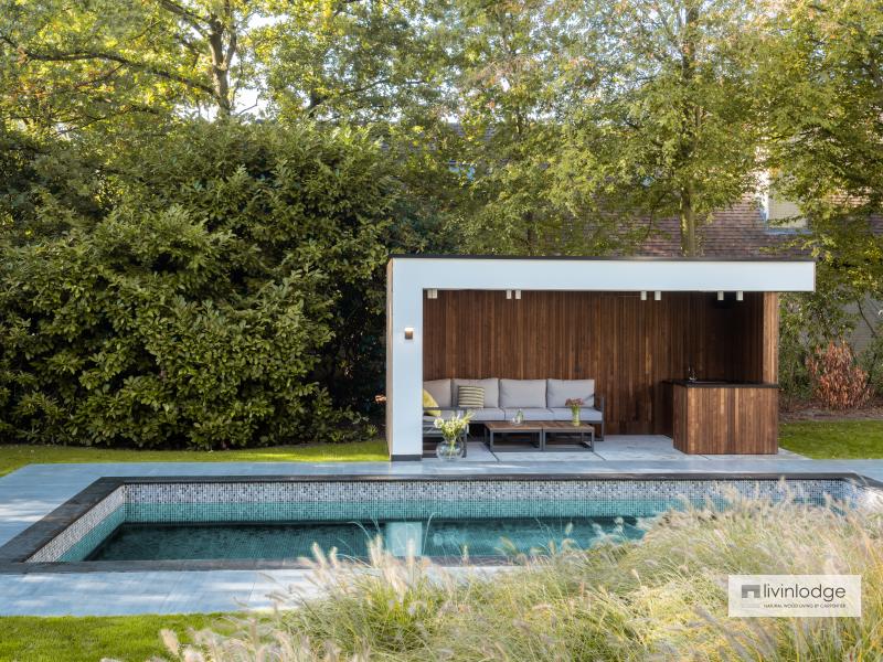 Moderne poolhouse in hout en witte crepi te Schoten | Houten bijgebouwen op maat Moderne poolhouse in hout en witte crepi te Schoten | Houten bijgebouwen op maat