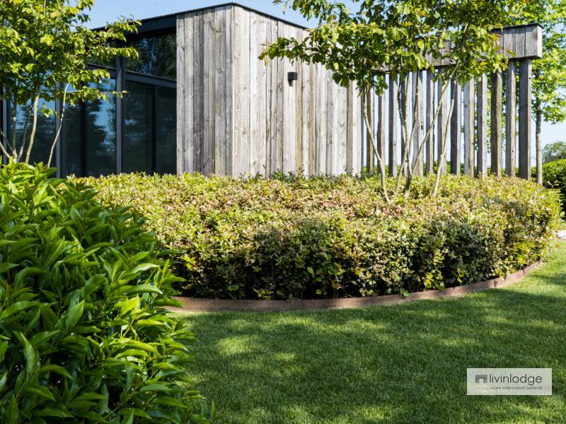 Houten bijgebouw met barnwood gevelbekleding Houten bijgebouw met barnwood gevelbekleding