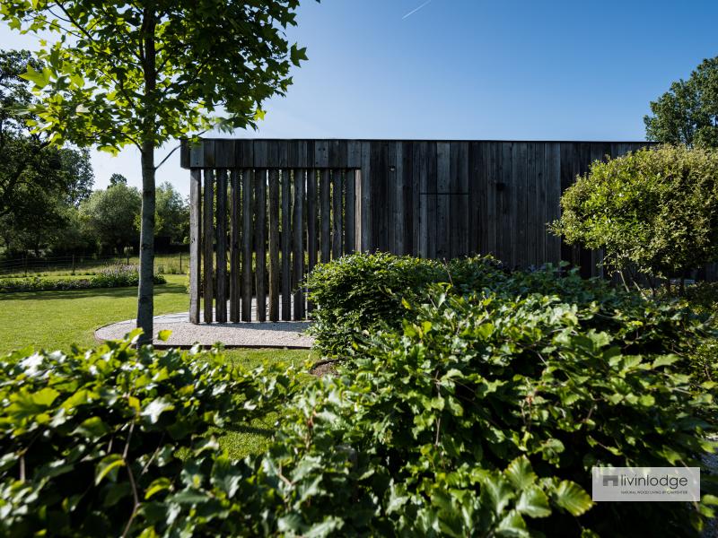 Barnwood bijgebouw gaat op in de natuurlijke omgeving Barnwood bijgebouw gaat op in de natuurlijke omgeving