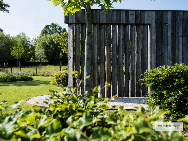 Houten bijgebouw met barnwood gevelbekleding Houten bijgebouw met barnwood gevelbekleding