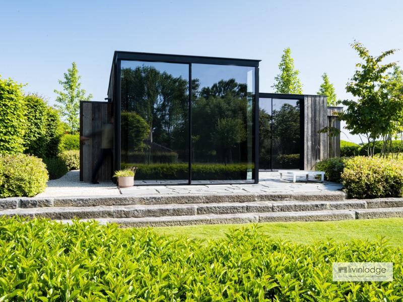 Luxe houten bijgebouw in een oase van rust Luxe houten bijgebouw in een oase van rust