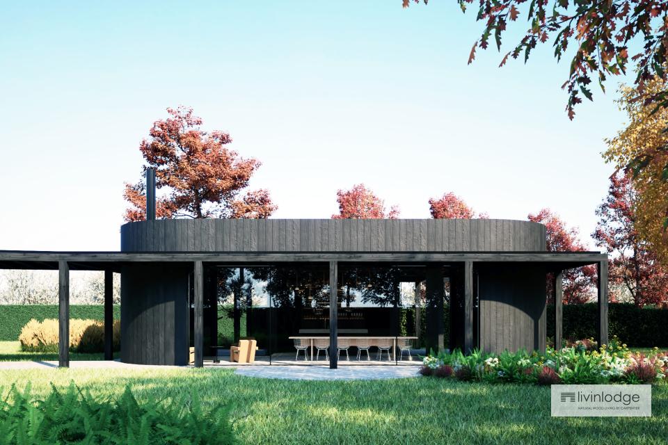 Modern houten bijgebouw met ronde vormen Modern houten bijgebouw met ronde vormen