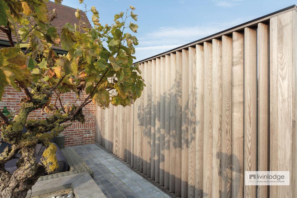 Wooden shutters for privacy and protection on patio Wooden shutters for privacy and protection on patio