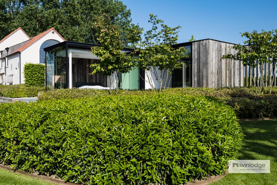 Modern houten bijgebouw met barnwood gevelbekleding Modern houten bijgebouw met barnwood gevelbekleding